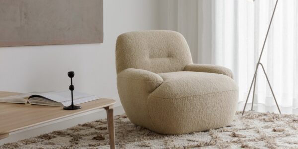 Sits Uma Armchair Upholstered in Fabric or Leather